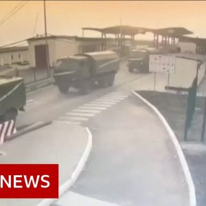 CCTV shows tanks and Russian military vehicles cross Ukraine border - BBC News