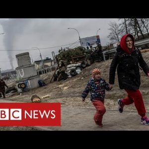 Children flee under fire as Russians advance on Kyiv - BBC News