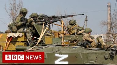 'Children' written in Russian near theatre bombed in Ukraine - BBC News
