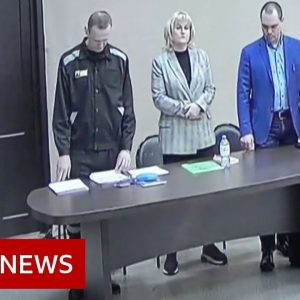 Putin critic Alexei Navalny jailed for nine years in Russian 'sham' trial - BBC News