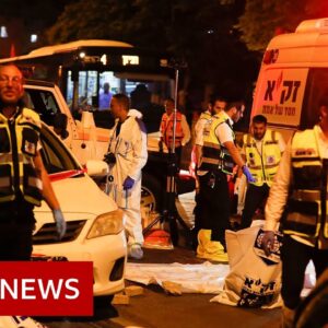 Manhunt for Palestinian axe attackers who killed three in Israel - BBC News