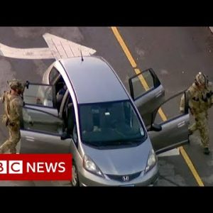 Suspect arrested over US mass shooting at 4 July parade - BBC News