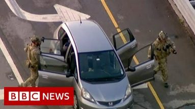 Suspect arrested over US mass shooting at 4 July parade - BBC News