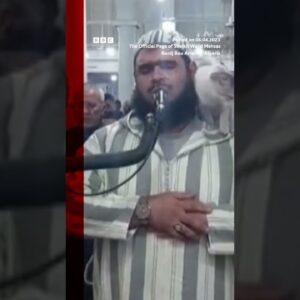 Cat jumps on imam leading Ramadan prayers. #Shorts #Ramadan #Algeria #BBCNews