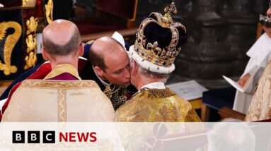 Prince William kisses King Charles on cheek in Coronation ceremony - BBC News