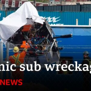 Titanic tourist sub wreckage brought ashore - BBC News