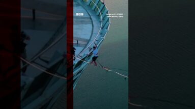 It holds less tension than a tightrope, and was suspended 185m (606ft). #Shorts #Qatar #BBCNews