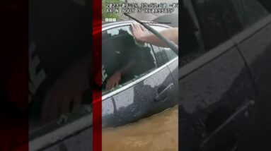 The moment a US police officer smashed a car to rescue a man from drowning #Shorts #BBCNews
