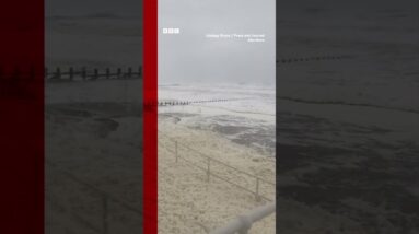 Sea foam has covered the Scottish coast during Storm Babet. #Shorts #Scotland #BBCNews