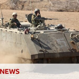 Israel troops taking positions near Gaza border - BBC News