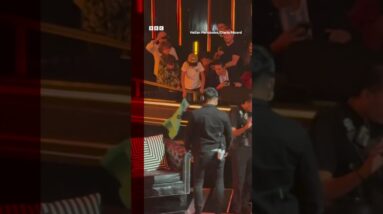 Shakira's ex and former footballer Gerard Pique falls off stage at event. #GerardPique #BBCNews