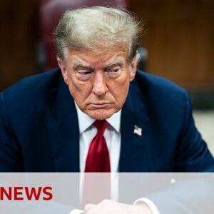 Donald Trump in court for historic hush-money trial | BBC News