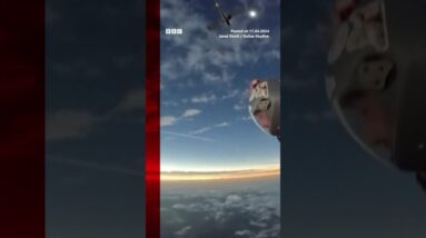 Skydivers witness total solar eclipse mid-air. #Shorts #Eclipse #BBCNews