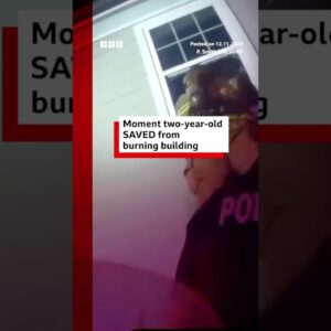 Moment two-year-old is saved from burning building in Texas. #Texas #BBCNews