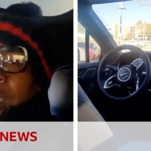 Watch moment driverless car traps man inside as it spins in circles | BBC News