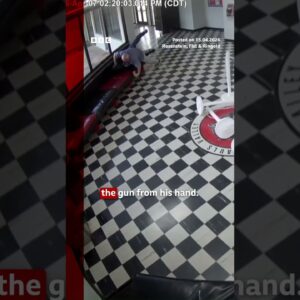 Moment gunman tackled by school principal in Oklahoma. #Oklahoma #CCTV #School #BBCNews