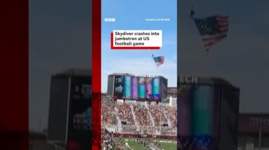 Skydiver crashes into jumbotron at US football game. #Virginia #BBCNews