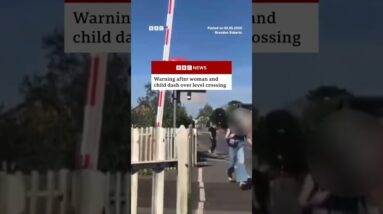 Warning issued after woman and child dash over level crossing. #England #BBCNews