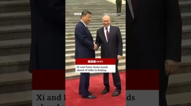 Xi and Putin shake hands before summit in Beijing. #BBCNews