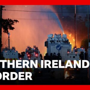Twelve police officers injured and water cannon fired after second night of NI riots | BBC News