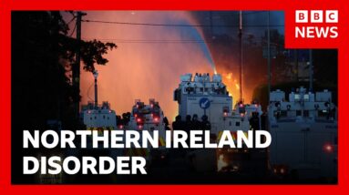 Twelve police officers injured and water cannon fired after second night of NI riots | BBC News
