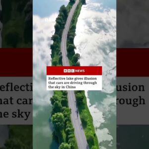 Reflective lake gives illusion that cars are driving through the sky in China. #BBCNews