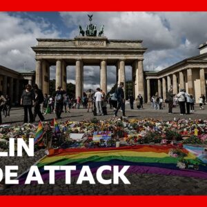 Crowds gather at Brandenburg Gate for vigil after vehicle driven into crowd | BBC News
