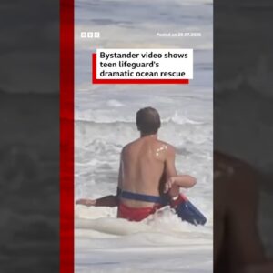 Bystander video shows teen lifeguard's dramatic ocean rescue. #BBCNews