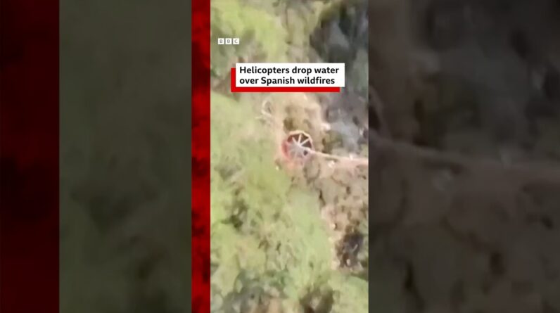 Helicopters drop water over Spanish wildfires. #BBCNews