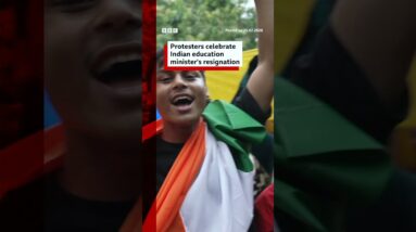 Protesters celebrate Indian education minister's resignation. #BBCNews