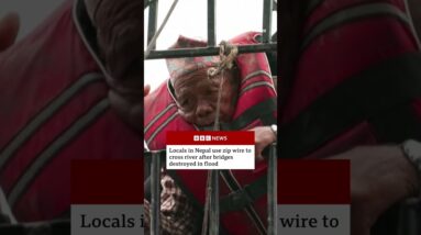 Nepali authorities build makeshift zip wire to help stranded locals across river. #Nepal #BBCNews