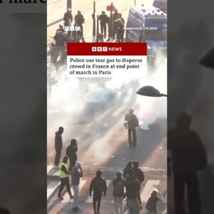 Police use tear gas to disperse crowd in France at end point of march in Paris. #France #BBCNews